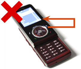 This handset does at least two things poorly. First, the keys are only labeled with impressed symbols and words, which are largely unreadable; the illumination is only there for some keys, and only for a brief time. Second, the softkeys are far removed from the screen, and have no obvious relationship to softkeys by shape, position or symbol. Note that the top-most key in the circle is not even a key, and is there purely for decoration, as well.